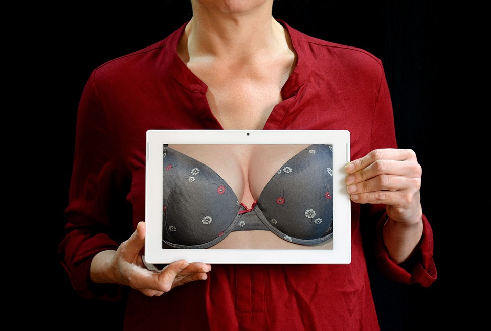 woman holding br apicture