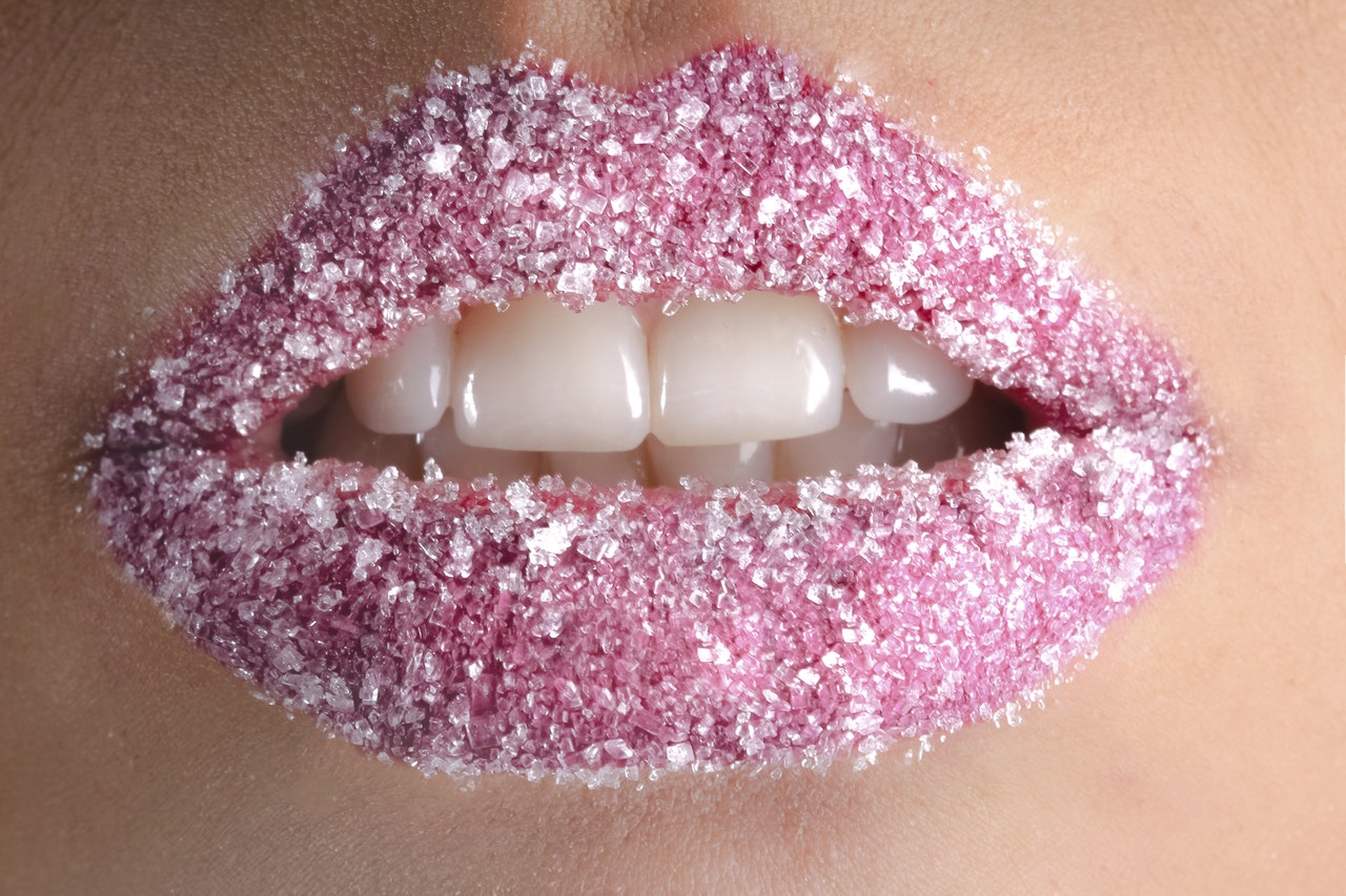 sugary pink lips and white teeth